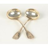 A pair of George IV Scottish silver Kings pattern ladles by Peter Aitken, Glasgow 1828, 3.7oz.
