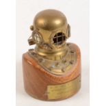 A novelty cigarette lighter in the form of a diver's helmet, height 12.5cm.