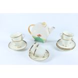 A part tea service, gilt decorated, comprising six cups, five saucers and a dissimilar teapot.