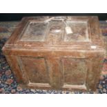 A cast iron safe, with twin carrying handles and key, height 38cm, width 54cm, depth 38cm.