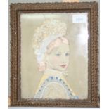 An early 20th century framed fabric portrait of a girl, 24 x 19cm.