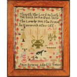 A needlework sampler by Jane Dower, aged 12 years, with verse and a cat seated on a cushion,