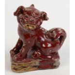 A Chinese pottery model of a dog of fo, height 13.5cm, width 12cm.