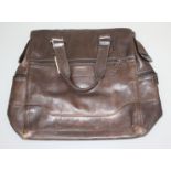 A Fossil brown leather holdall, 40 x 49cm.