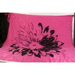 A Charles Jourdan Paris pink and black silk fringed shawl, with floral motif, 130 x 125cm.