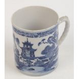 A Chinese porcelain blue and white porcelain tankard, 18th century, depicting a river scene,