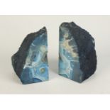 A pair of blue agate bookends, height 16cm.