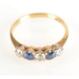 An 18ct gold ring set three diamonds alternating with two sapphires.