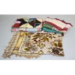 A quilt with red and white floral trim, 160 x 194cm, together with another quilt with velvet tiles,