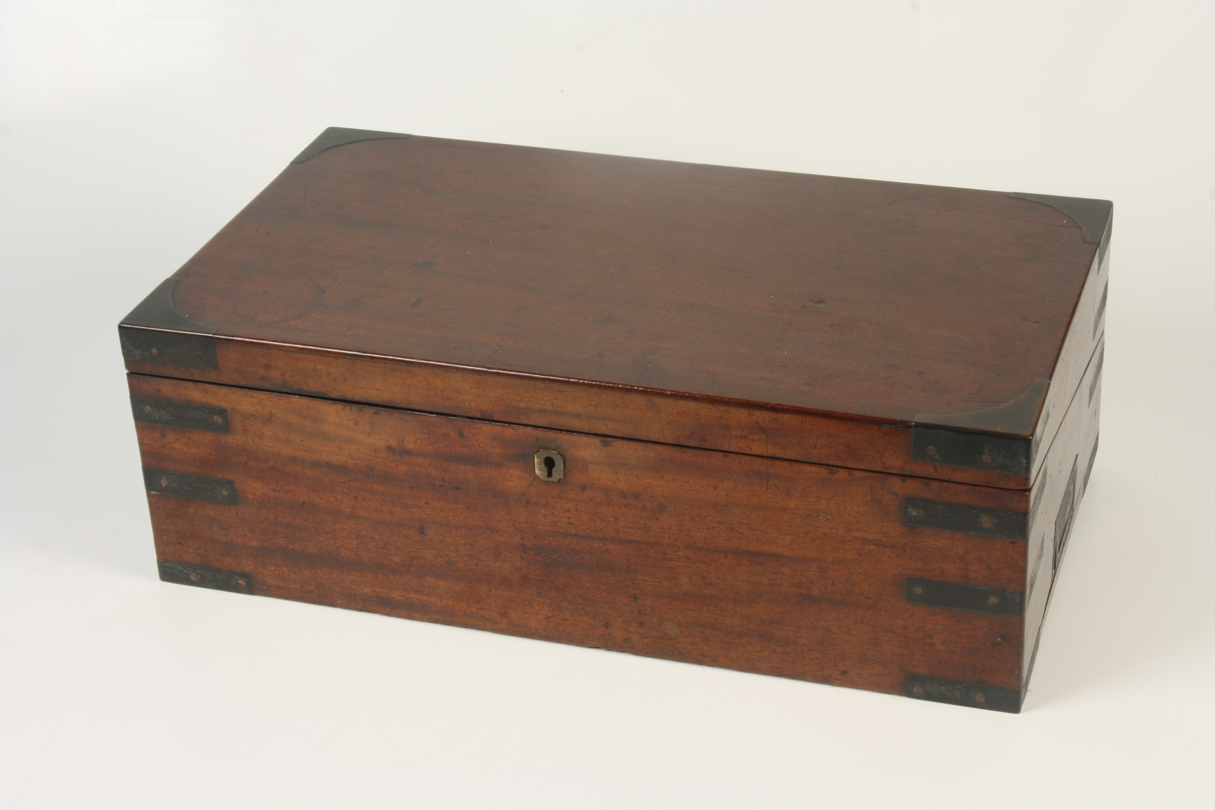 A Victorian mahogany brass bound writing slope, height 17cm, width 50.5cm, depth 28cm.