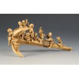 A Japanese ivory okimono of a roped four bladed ship's anchor,