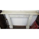 A marble fire surround, the rectangular moulded shelf above a floral and scroll decorated frieze,