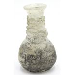 A Roman glass vase, height 13.5cm.