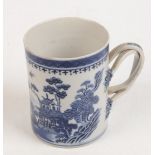 A Chinese porcelain blue and white porcelain tankard, 18th century, depicting a river scene,