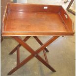 A mahogany butler's tray on stand, 19th century, height 92cm, width 66cm, depth 44.5cm.