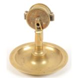 A novelty brass ashtray in the form of a ships telegraph, inscribed United Ship Stores, A.