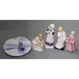 Four Royal Doulton figures and a Crown Derby teapot stand.