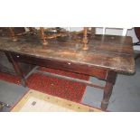 An oak refectory table, with a single frieze drawer,