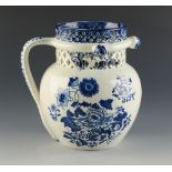 A Swansea Cambrian blue and white pottery puzzle jug, early 19th century,