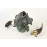 A pottery fish garden ornament, height 32cm and two brass models of carp, 34.5cm and 20.5cm.
