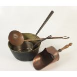 A copper saucepan, a brass preserve pan, a copper scoop and a copper ladle.