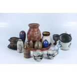 A collection of studio and other pottery, including a miniature vase by Phil Rogers.