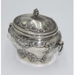 An Edwardian vase shaped embossed sugar box with hinged lid and ring handles, 5.5oz.