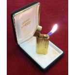 A Dunhill gold plated gas cigarette/ pipe lighter, stamped "Made in England" C80854