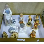 Five Hummel figures together with two Hummel miniature plates, a Lladro angel and Lladro duck with