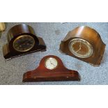 A mahogany cased Napolean hat style mantle clock together with another two cased mantle clocks (3)