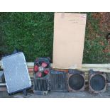 A Sierra 2.3 lt radiator NOS, together with other Mini radiators.