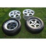 Two pairs of alloy wheels.