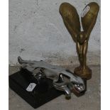 A Jaguar Leaping Cat chrome bonnet mascot, mounted on an onyx base and a reproduction gilt Spirit of