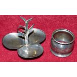 An Edwardian silver ring stand, Birmingham 1902, of trefoil form and a silver napkin ring (2)