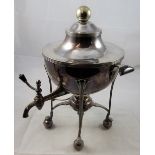 An electroplated tea urn by Mappin and Webb, circular bowl with reeded border, raised on four legs