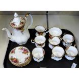 A Royal Albert Old Country Roses tea service comprising six cups and saucers, sugarbowl, milk jug