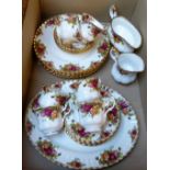A Royal Albert Old Country Roses tea service, 6 dinner plates, side plates, cups and saucers, one