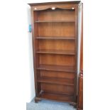 A reproduction mahogany tall and narrow open bookcase, 87cm wide, 185cm high