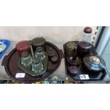 A quantity of Bakelite including Burgundy serving tray, cruet, green jewellery box, a collection