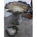 A bird bath on stand together with a smaller one (2)