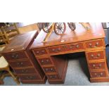 A small reproduction mahogany double pedestal desk with inset top, 91cm wide and the matching two-