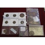 A quantity of metal detector found tokens and coins