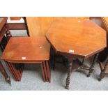 A teak nest of three graduated occasional tables, largest 55cm wide and an Edwardian walnut