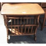 An Ercol Golden Dawn elm combined coffee able and magazine rack, 55cm wide