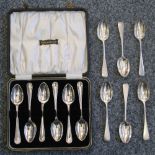 A silver set of bead pattern teaspoons, Sheffield 1931, case, and a silver set of Old English