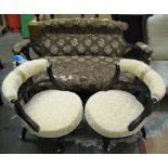 A pair of Edwardian walnut tub armchairs, the carved open backs with upholstered top rail, and an