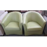 A pair of lime green leather swivel tub armchairs