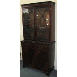 A reproduction mahogany Georgian style bookcase on cupboard, 93cm wide, 186cm high