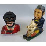 A cast-iron mechanical money box, as the head and shoulders of a man with black head and red/white