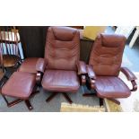 A pair of Scandinavian maroon upholstered swivel armchairs, each with matching footstool